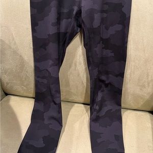 Lululemon leggings. Black camo print. 25 inches long. Size 0. Barely worn.
